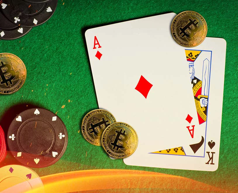 bitcoin poker chips with high cards on table